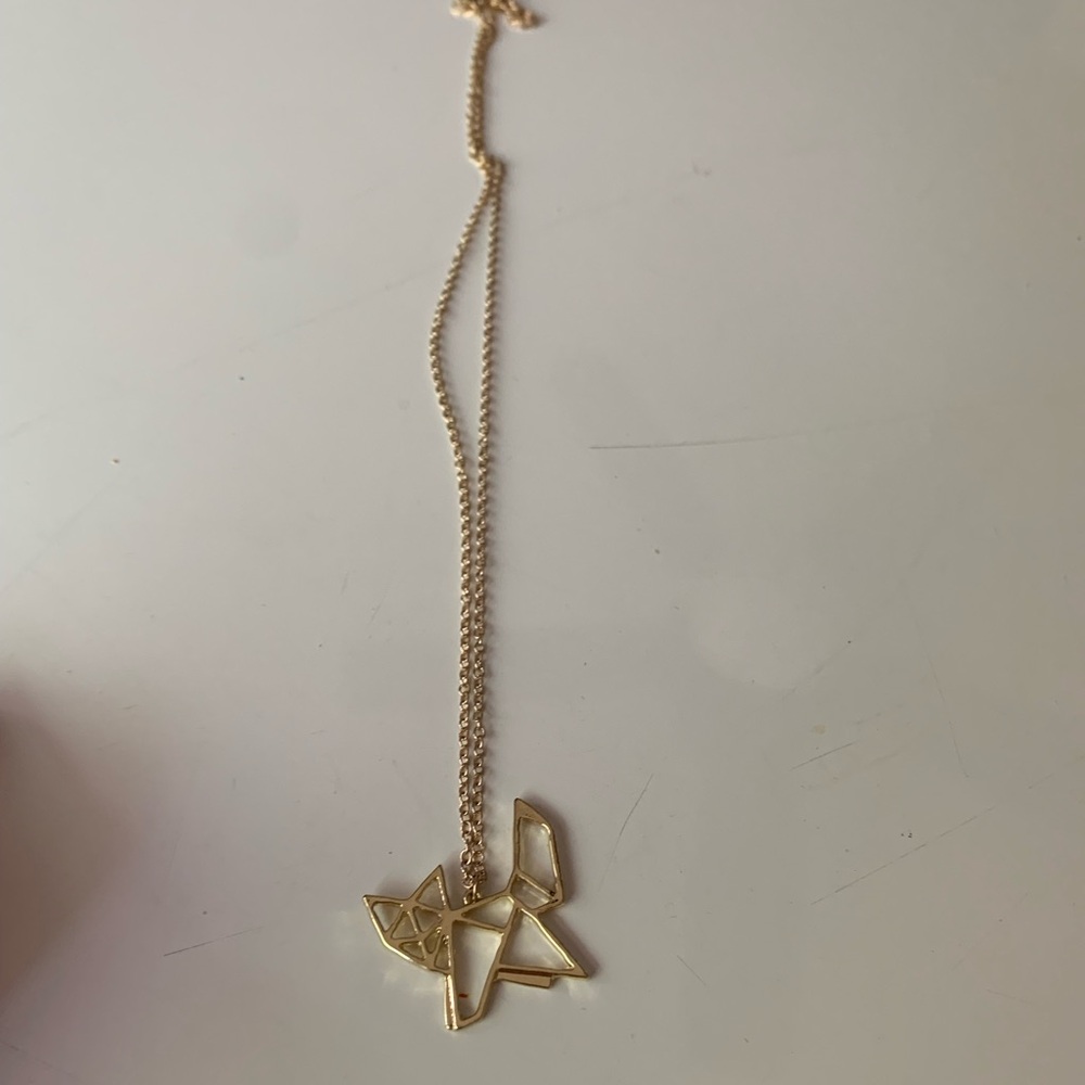 Gold tone fox origami geometric necklace.